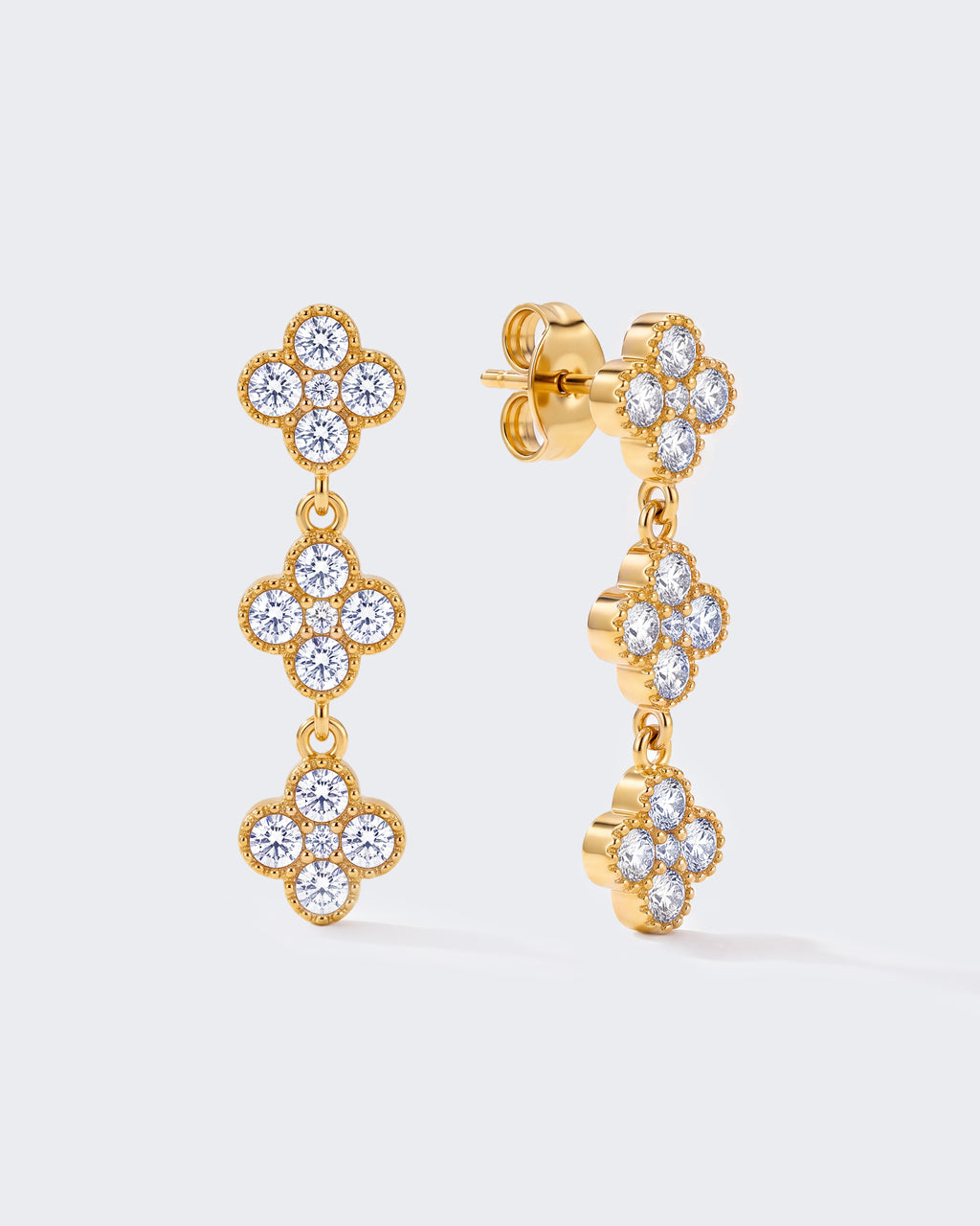 Ohrstecker aus 18-karätigem Gold mit drei Diamanten